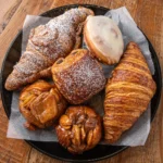 Assorted Pastry Platters - a selection of mini monkey bread, cinnamon buns, & assorted croissants: classic, almond, and chocolate Small