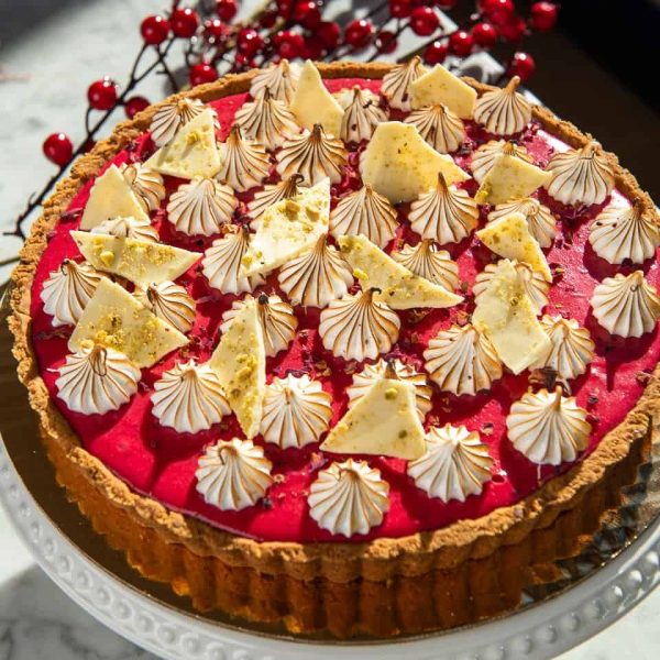 Cranberry Rose Tart ~ cranberry citrus curd, toasted rose meringue, pistachio pate sucree, rose petals, white chocolate pistachio bark